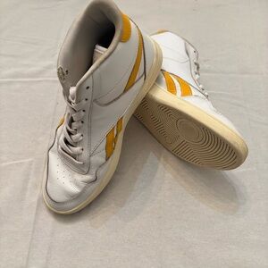 Reebok Women’s White and Orange High-Top Sneakers